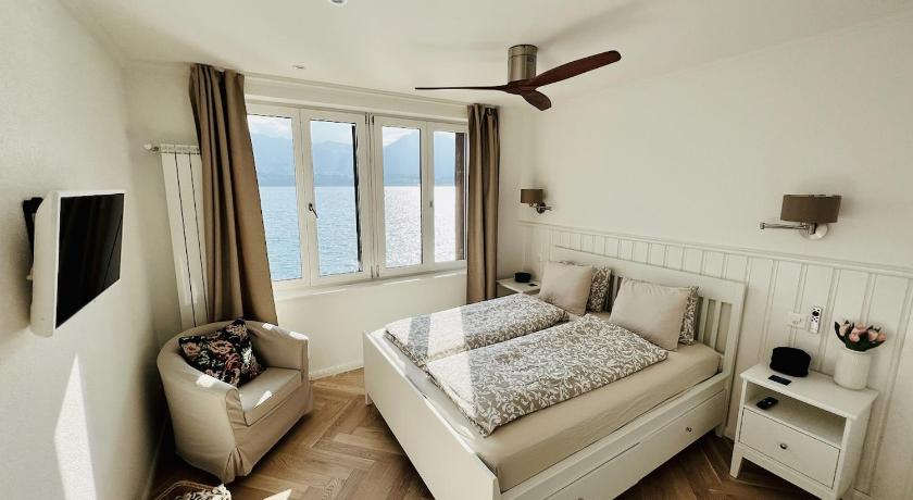 Bedroom 3, Boutique Hotel Niesenblick - direkt am Thunersee gelegen mit SELF CHECK IN & digitaler Rezeption, Thun