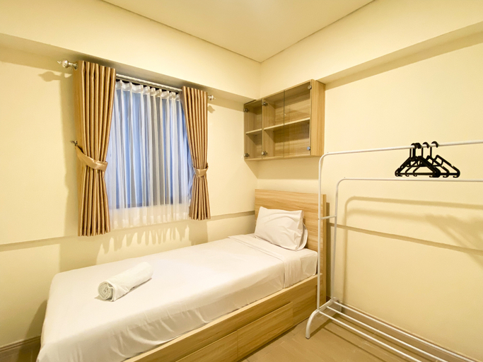 Bedroom 3, Comfortable and Nice 2BR Apartment at Meikarta By Travelio, Cikarang