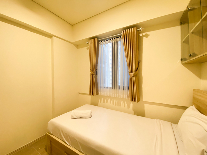 Bedroom 2, Comfortable and Nice 2BR Apartment at Meikarta By Travelio, Cikarang