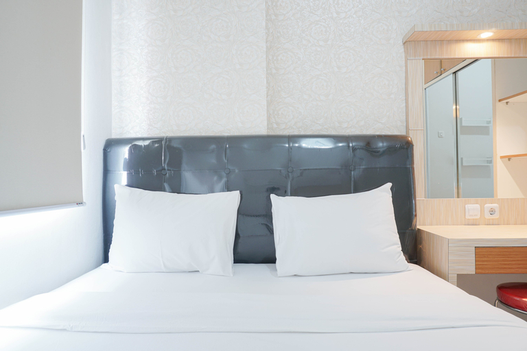 Cozy and Minimalist 2BR Green Pramuka City Apartment above Shopping Center By Travelio, Central Jakarta