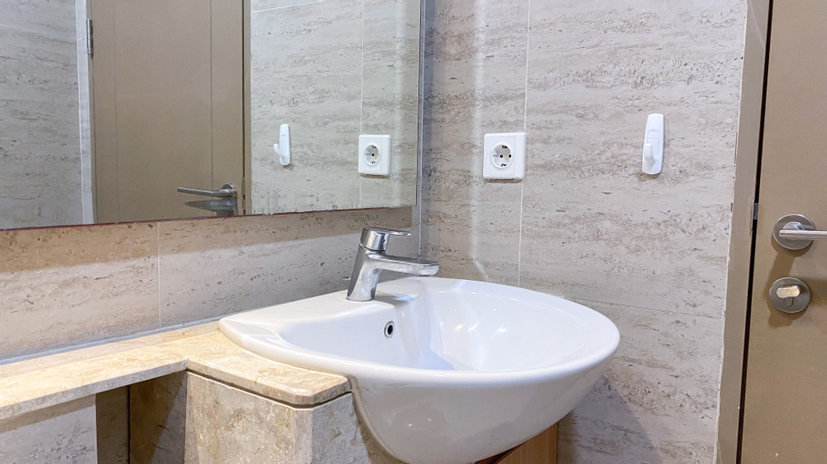 Bedroom 3, Spacious and Comfort Stay 3BR at Gold Coast Apartment By Travelio, North Jakarta
