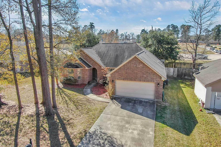 Exterior & Views 2, Welcoming Montgomery Home in Gated Community!, Montgomery