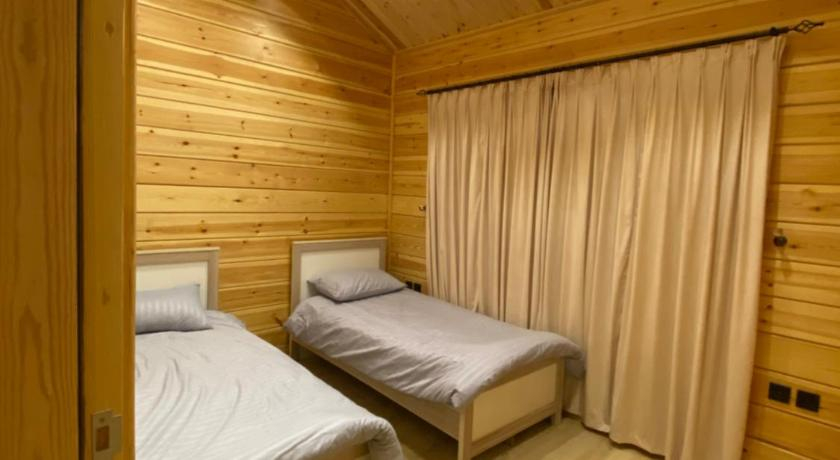 Bedroom 2, اكواخ تولين الريفية
