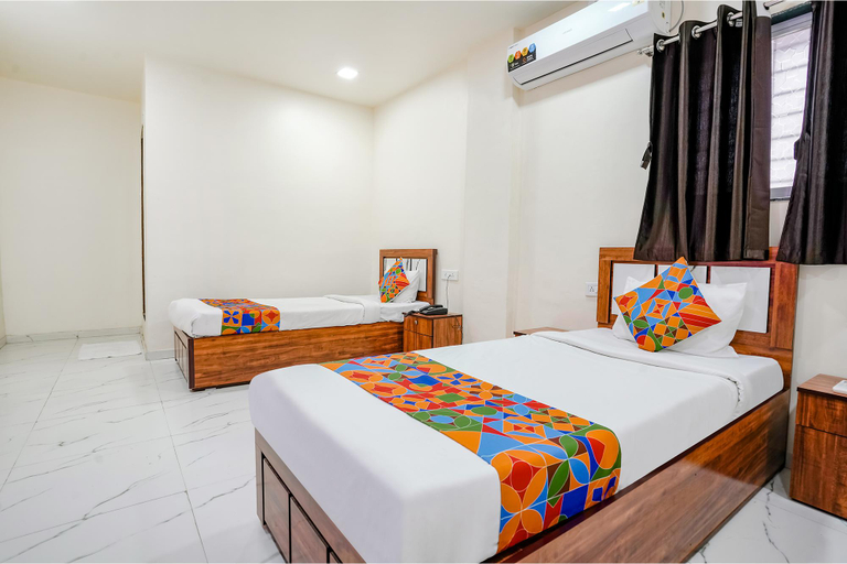 Bedroom 3, FabExpress Chaitanya Inn, Pune