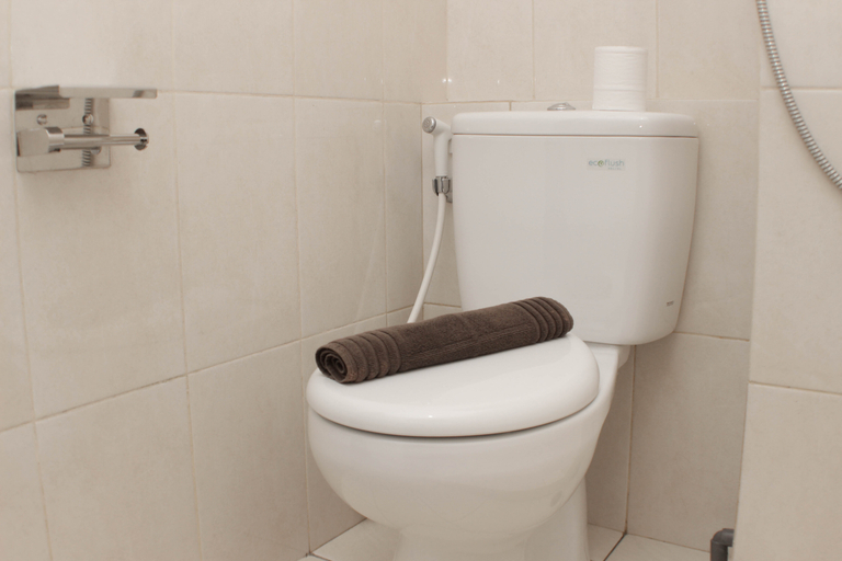 Bathroom 5, Modern and Comfort Studio Apartment at Springlake Summarecon Bekasi By Travelio, Bekasi