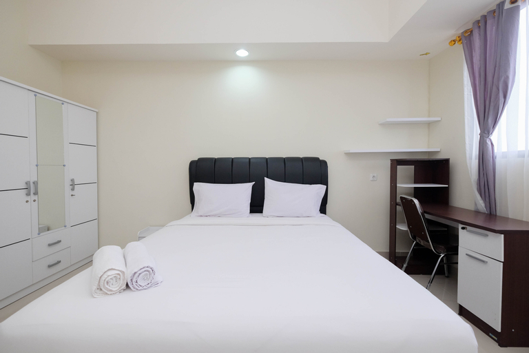 Bedroom 1, Fancy and Nice Studio at Evenciio Margonda Apartment By Travelio, Depok