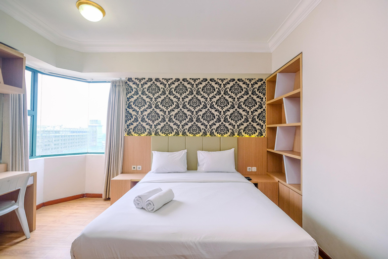 Bedroom 1, Elegant and Nice 3BR Apartment at Sudirman Tower Condominium By Travelio, South Jakarta