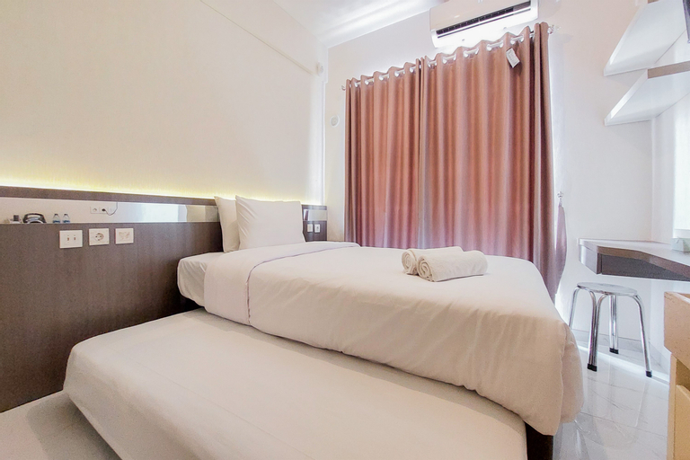 Bedroom 1, Minimalist Designed and Homey Stay Studio at Sky House BSD Apartment By Travelio, South Tangerang