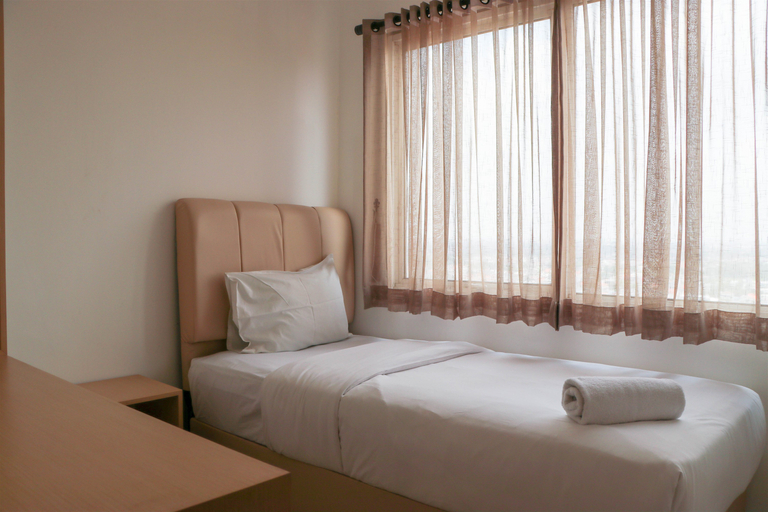 Bedroom 3, Cozy Living and Serene 2BR at The Nest Puri Apartment By Travelio, Tangerang