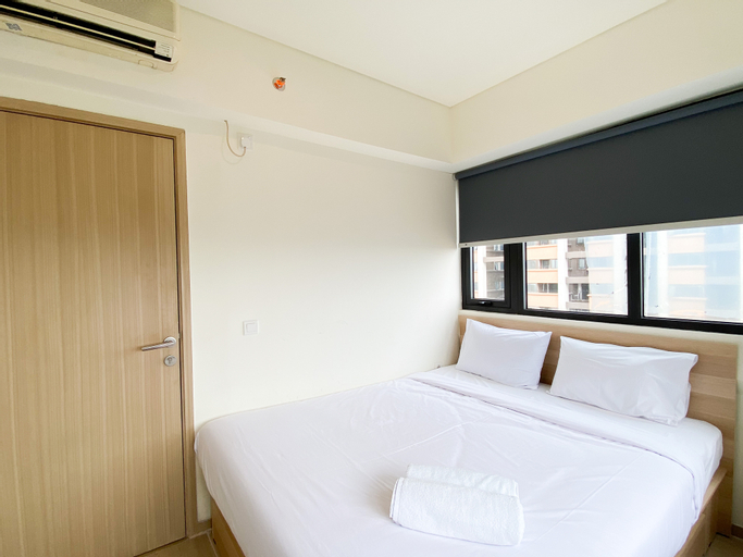 Bedroom 2, Modern and Homey 2BR at Meikarta Apartment By Travelio, Cikarang
