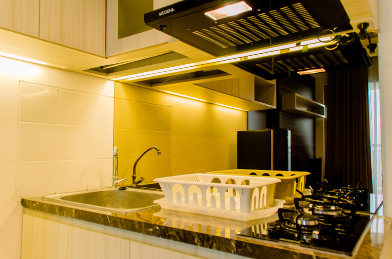 Others 2, Nice and Comfort 1BR at M-Town Siganture Apartment By Travelio, Tangerang