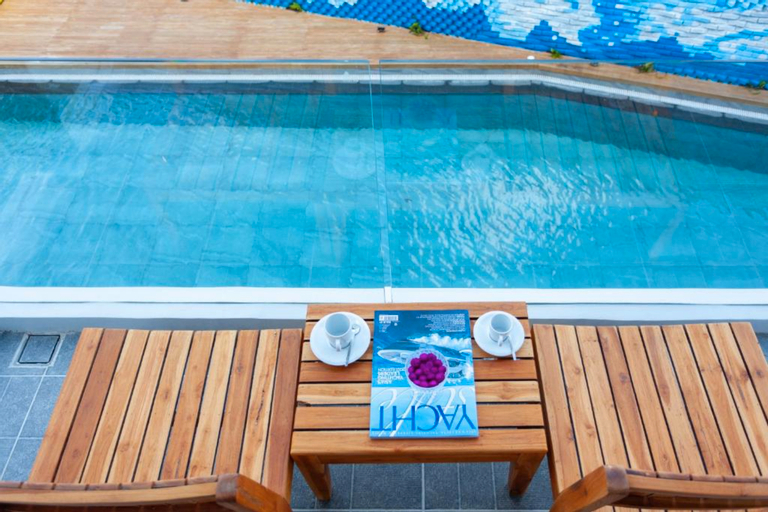 Anona Beachfront Phuket Resort - Tap to explore photos