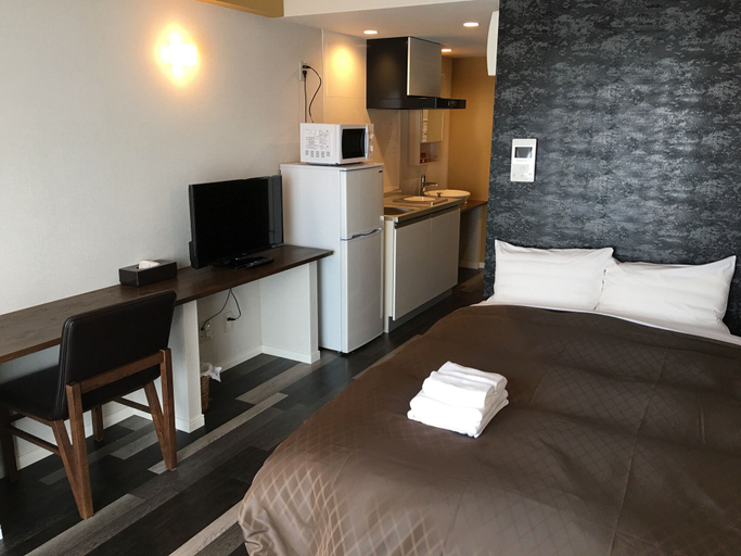 Bedroom 2, Mr KINJO in Nishihara Inter, Ginowan