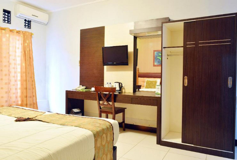 Hotel Indra Djaya - Tap to explore photos