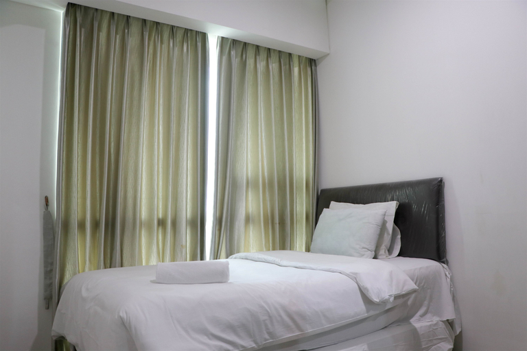 Bedroom 3, Great Deal 2BR at St. Moritz Puri Apartment By Travelio, Jakarta Barat