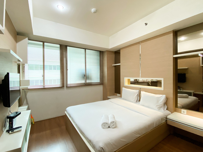 Modern Look and Comfort 2BR Kemang Village Apartment By Travelio, South Jakarta