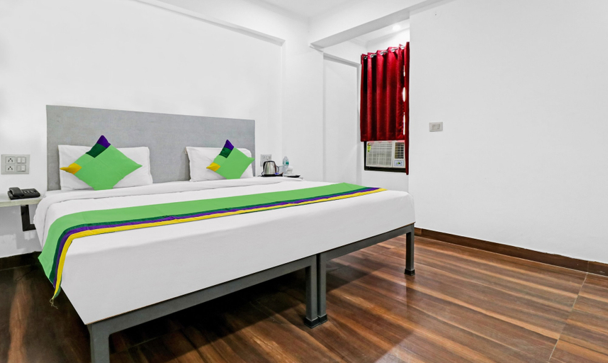 Bedroom 1, Treebo Grand Town House, Faridabad