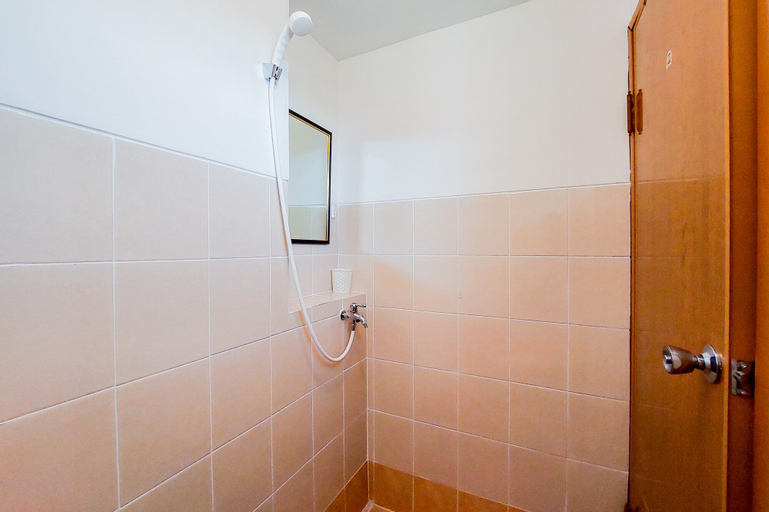 Bedroom 3, Comfy and Modern Studio (No Kitchen) at Loftvilles City Apartment By Travelio, South Tangerang