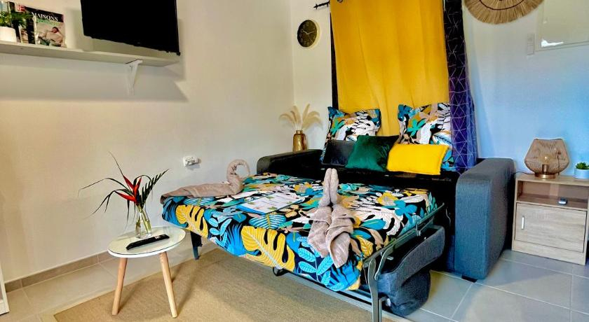 Bedroom 3, Cocon des jardins - Bungalow cosy & intime, Gros-Morne
