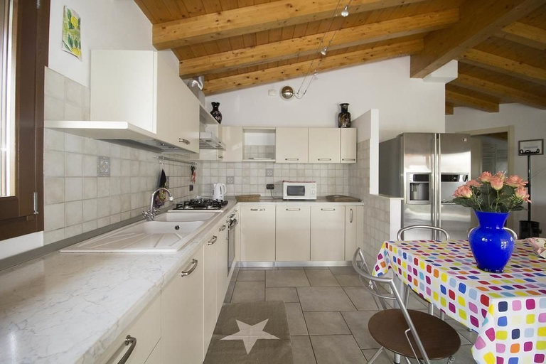 Others 5, Veranda House, Brescia