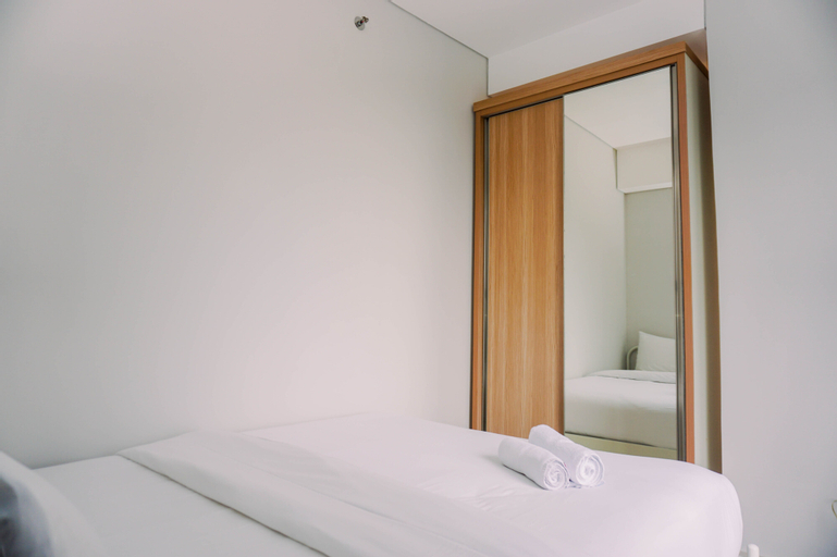 Bedroom 2, Comfort and Homey 2BR at Transpark Bintaro Apartment By Travelio, South Tangerang