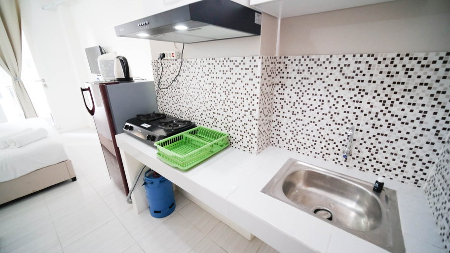 Others 4, Compact and Tidy Studio at Puncak Dharmahusada Apartment By Travelio, Surabaya