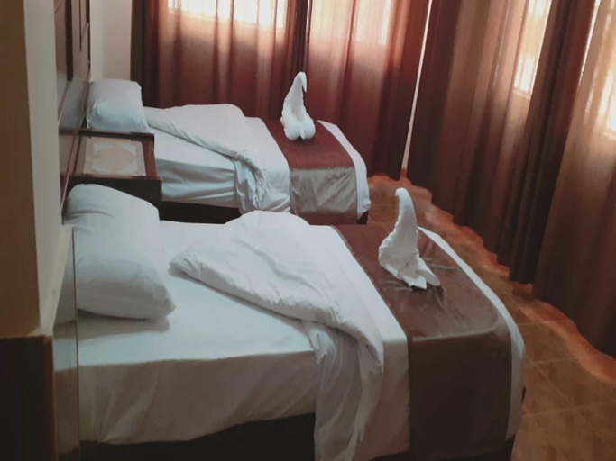 Bedroom 3, Al-Nujoom Hotel Suites, Amman