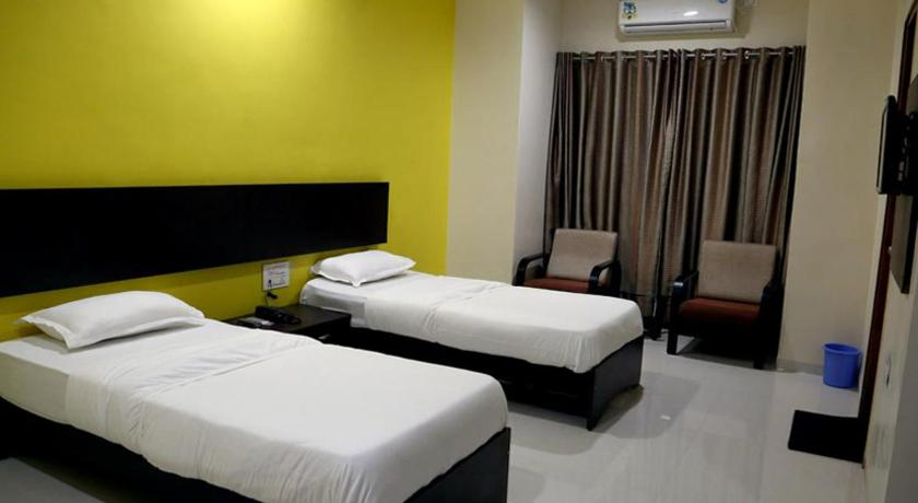 Bedroom 2, Hotel Varenya Inn, Yavatmal