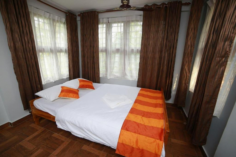 Bedroom 1, God's Land Resorts, The Nilgiris
