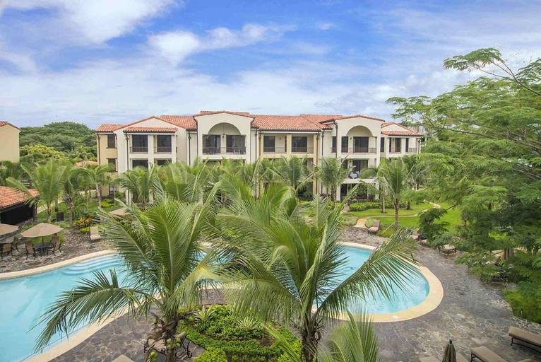 Exterior & Views, Impressively designed and decorated 3rd-floor space overlooking pool in Coco, Carrillo