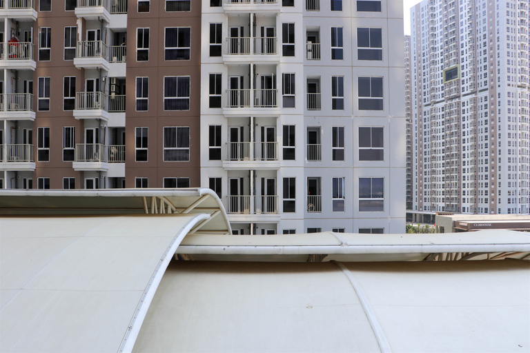 Exterior & Views, Minimalist and Warm Studio Tokyo Riverside PIK 2 Apartment By Travelio, Tangerang