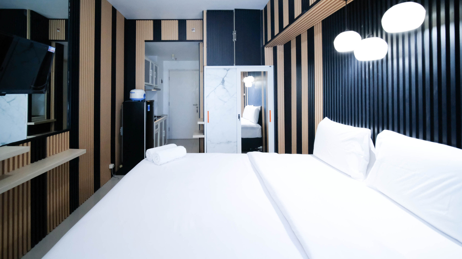 Bedroom 2, Comfy Studio Connected to Mall at Orchard Supermall Mansion Apartment By Travelio, Surabaya