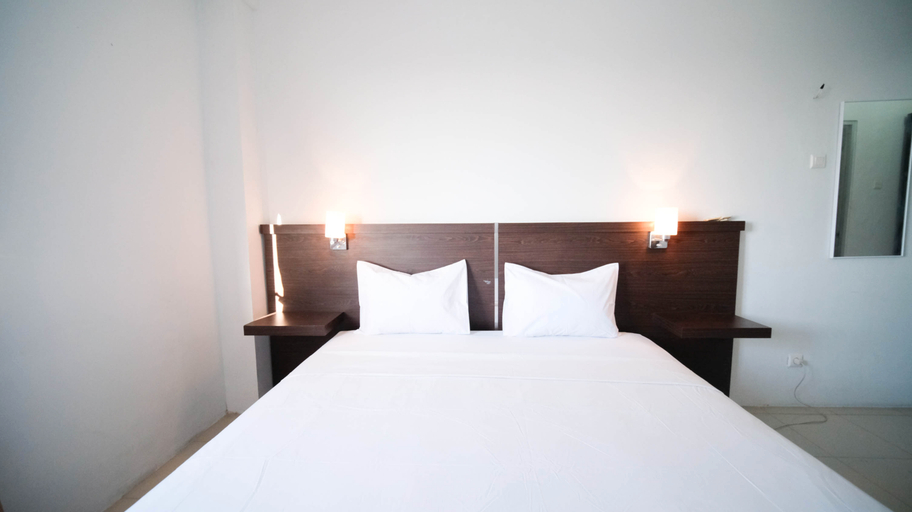 Simple 2BR with Extra Bed at Menara Rungkut Apartment By Travelio, Surabaya