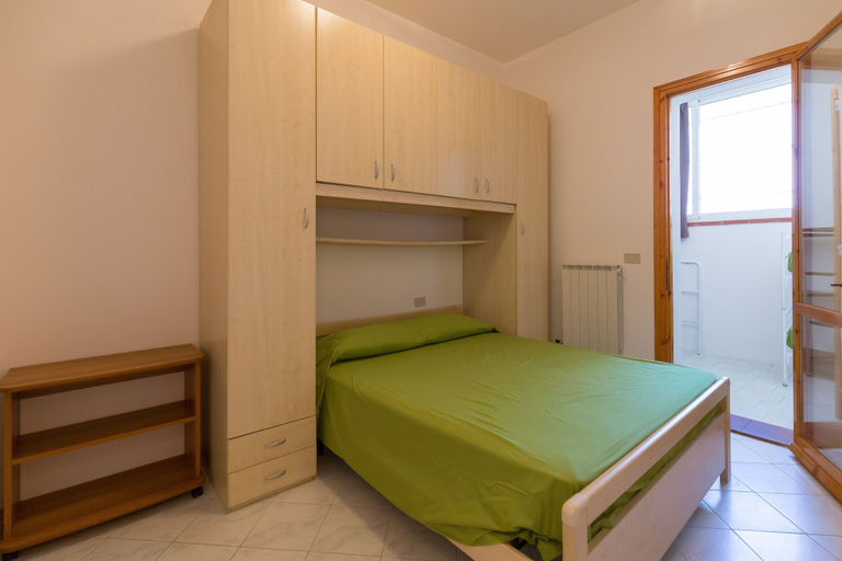 Room 4, Bilocale Smeraldo, Ferrara
