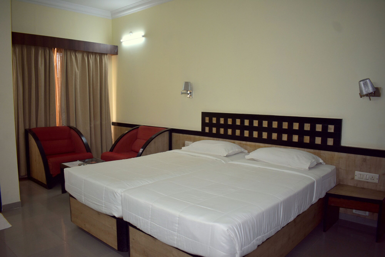 Bedroom 3, Metropolis Hotel, Dharwad