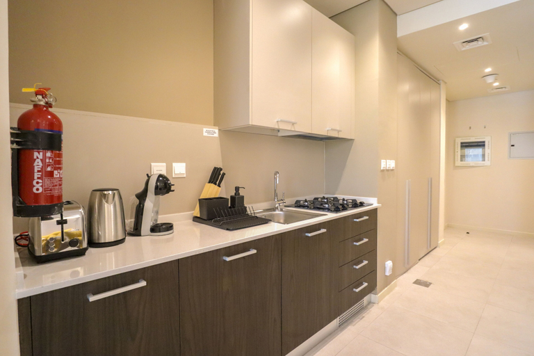 Private kitchen, WelHome - Modern studio for an exquisite getaway, Dubai