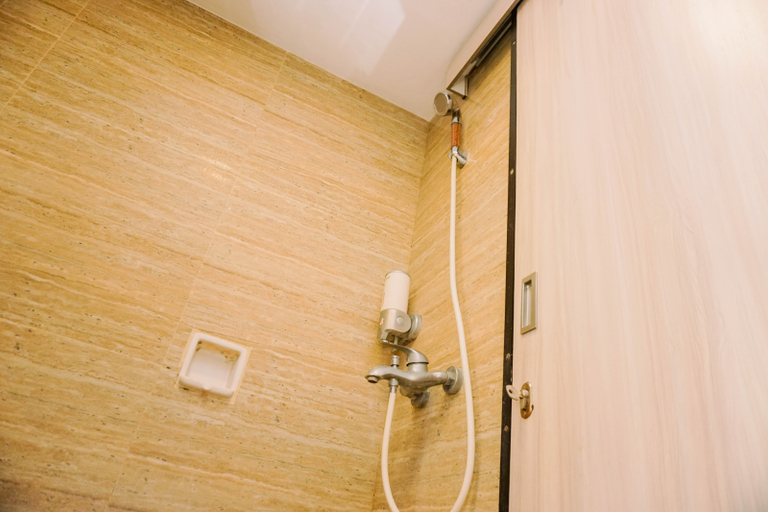 Bathroom 5, Fancy and Nice 2BR at Gading Greenhill Apartment By Travelio, North Jakarta