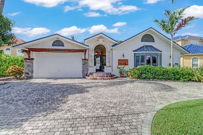Exterior & Views 2, 1034 Dolphin Dr, Lee