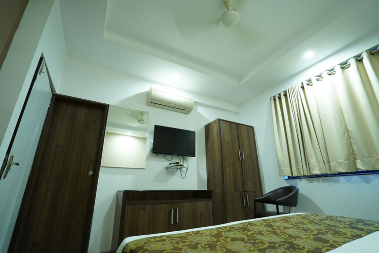 Bedroom 2, Hotel Flora Inn, Nagpur