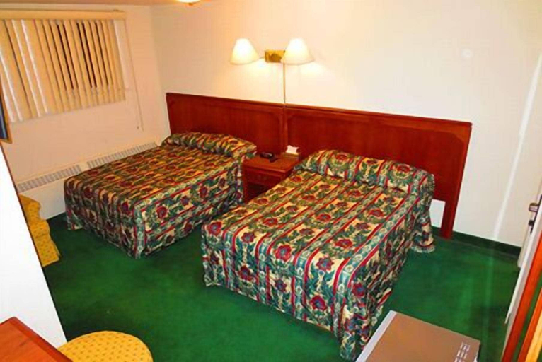 Bedroom 4, Canadiana Motel, Grey