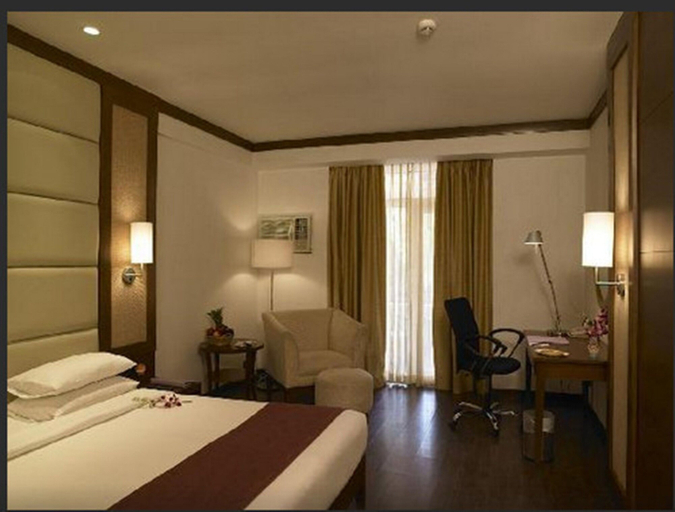 Bedroom 5, Royal Orchid Resort & Convention Centre, Bangalore