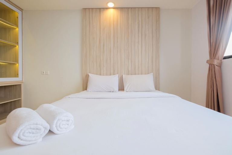 Minimalist 1BR with Extra Room at Evenciio Margonda Apartment By Travelio, Depok