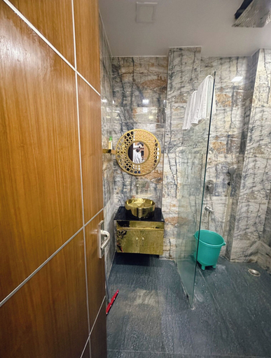 Bathroom, Goroomgo Omasha Residency Noida, Gautam Buddha Nagar