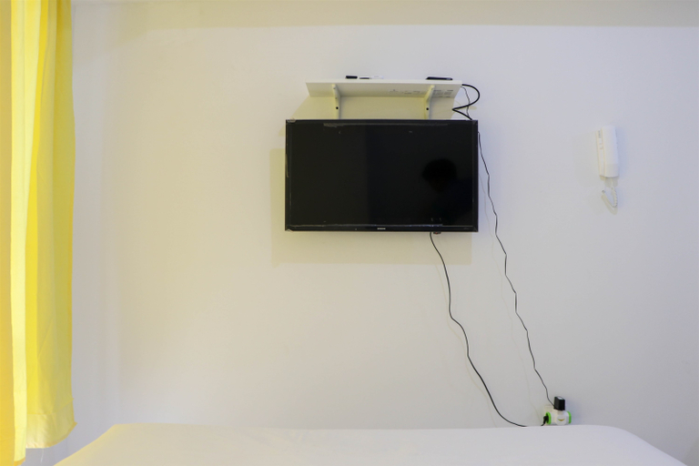 Bedroom 2, Compact and Tidy Studio at Tokyo Riverside PIK 2 Apartment By Travelio, Tangerang
