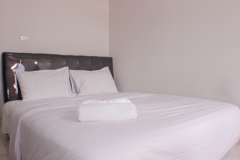 Bedroom 1, Modern and Cozy Studio at Springlake Summarecon Bekasi Apartment By Travelio, Bekasi