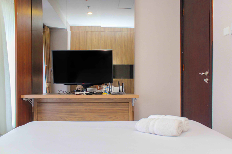 Bedroom 3, Nice and Enjoy 1BR at Sudirman Suites Apartment By Travelio, Central Jakarta