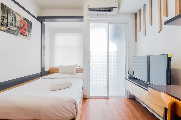 Warm and Cozy Living Studio Serpong Garden Apartment By Travelio, Tangerang