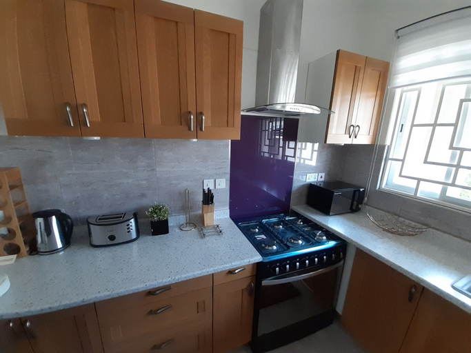 Private kitchen 3, Accra Cozy Retreat With 2 Bedrooms, Tema