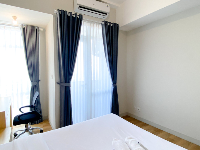 Bedroom 3, Combined and Nice 2BR at Vasanta Innopark Apartment By Travelio, Cikarang