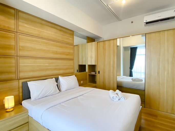 Bedroom 2, Combined and Nice 2BR at Vasanta Innopark Apartment By Travelio, Cikarang